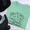 Picture of cowboy boots and hat with Island reef colored comfort colors t-shirt - Follow The Word