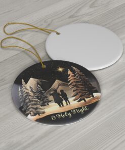 "Oh Holy Night" Christmas ornament, featuring a father and daughter stargazing on a snowy night under a brilliant guiding star.