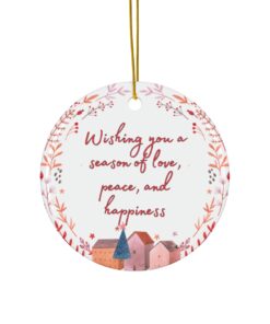 Ornament with village scene, pink-red wreath, with message 'Wishing you a season of love, peace, and happiness