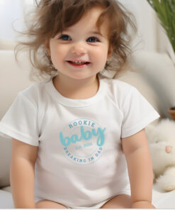 Toddler in white Infant Fine Jersey Tee with Rookie Baby on it