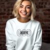 White sweatshirt with the word "believe" nestled inside the word "God" across the chest