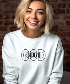 White sweatshirt with the word "believe" nestled inside the word "God" across the chest