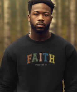 Black Gildan 1800 Sweatshirt the the word Faith across the chest.