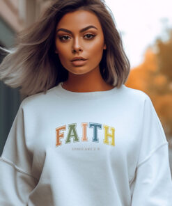 White Gildan 1800 Sweatshirt the the word Faith across the chest