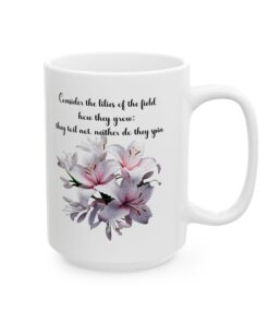 White ceramic mug with the phrase "Consider the Lilies of the Field" and floral accents. Christian mug with a Bible verse for daily inspiration.