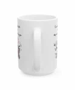 Back view of white ceramic mug with the phrase 