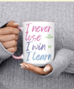 15 oz white ceramic mug features the inspiring quote by Mandela: "I never lose. I either win or I learn."