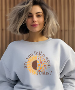 Woman wearing Ash colored Gildan 1800 sweatshirt Are you fall o ween Jesus