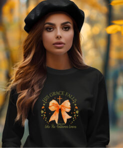 Young Woman wearing a Black Gildan 1800 Sweatshirt with Design that says His Grace Falls Like The Autumn Leaves