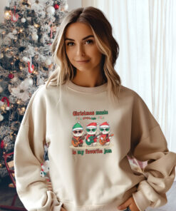 Woman wearing a sand colored Gildan 1800 sweatshirt Christmas music is my favorite jam