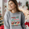 a woman wearing a sport gray Gildan 1800 sweatshirt that says Christmas music is my favorite jam