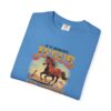Blue Vintage western design of a running horse with the text “If It Involves Jesus and Horses Count Me In” on a folded T shirt, Christian horse lover graphic
