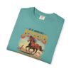 Vintage western design of a running horse with the text “If It Involves Jesus and Horses Count Me In” on a folded T shirt, Christian horse lover graphic