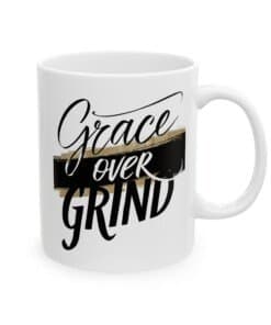 Christian Coffee Mug - Grace Over Grind with bold black script and gold brushstroke, faith based inspirational gift.