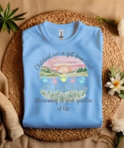Blue Flat fold Children Are a Gift From God Floral Christian T-Shirt featuring a watercolor sunrise, handprint flowers, and faith-based quote.