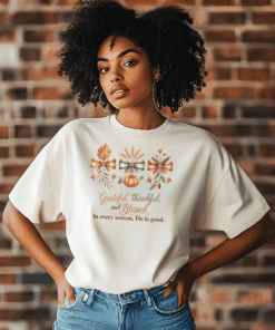 An African American Woman wearing a Gildan 5000 T-shirt That Says Grateful, Thankful, Blessed