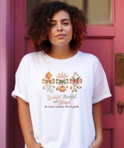 Woman wearing white Gildan 5000 Tshirt with Grateful Thankful Blessed on it